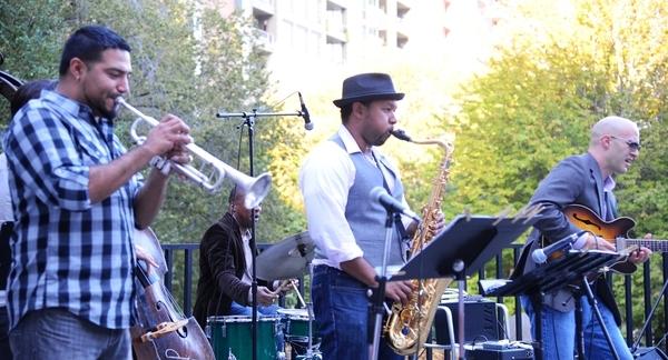 Five jazz musicians perform on the MCA terrace.