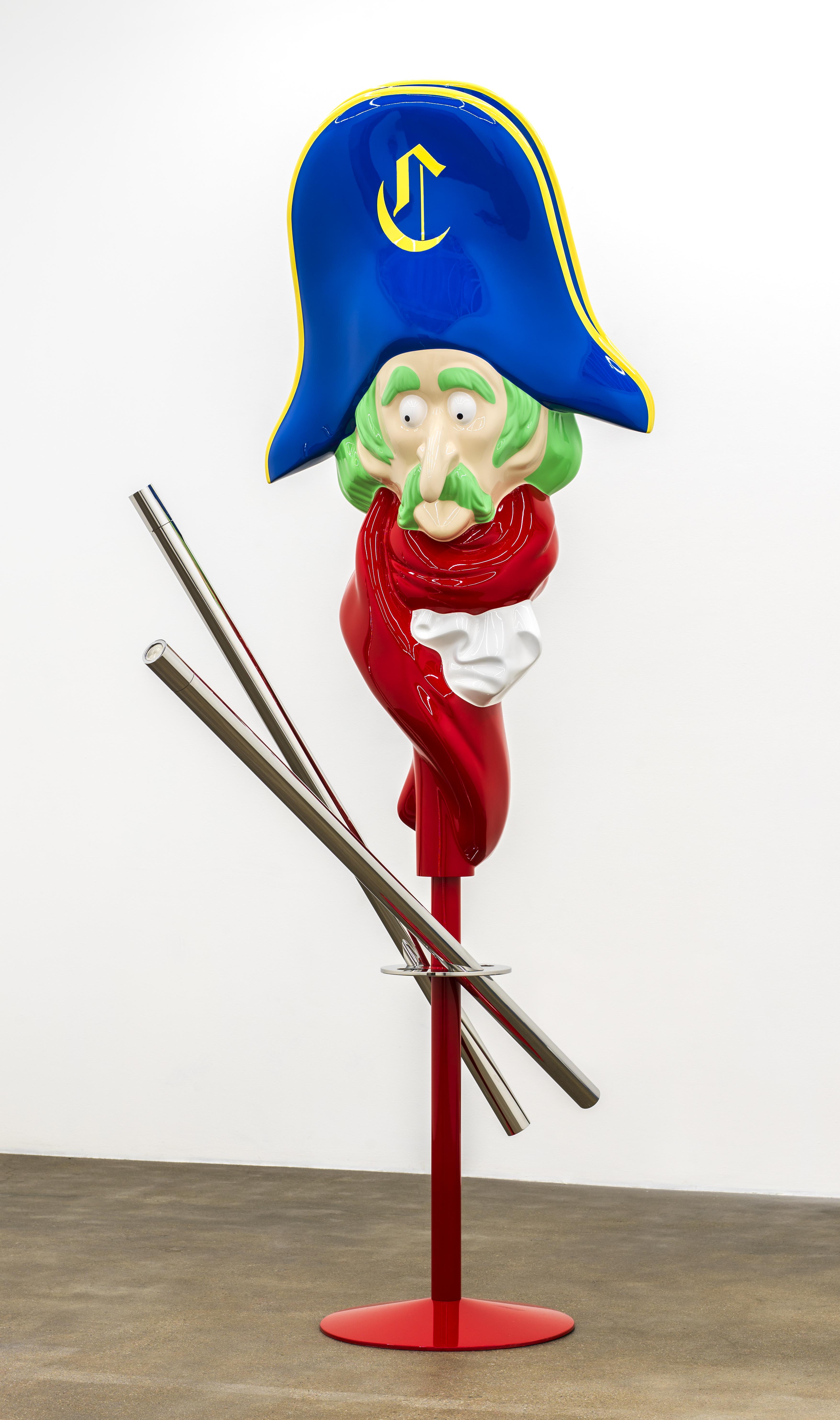 A red column resembling a coat stand balances two silver tubes and is topped by the head of a colorful pirate with green hair, a blue hat, and a red scarf.