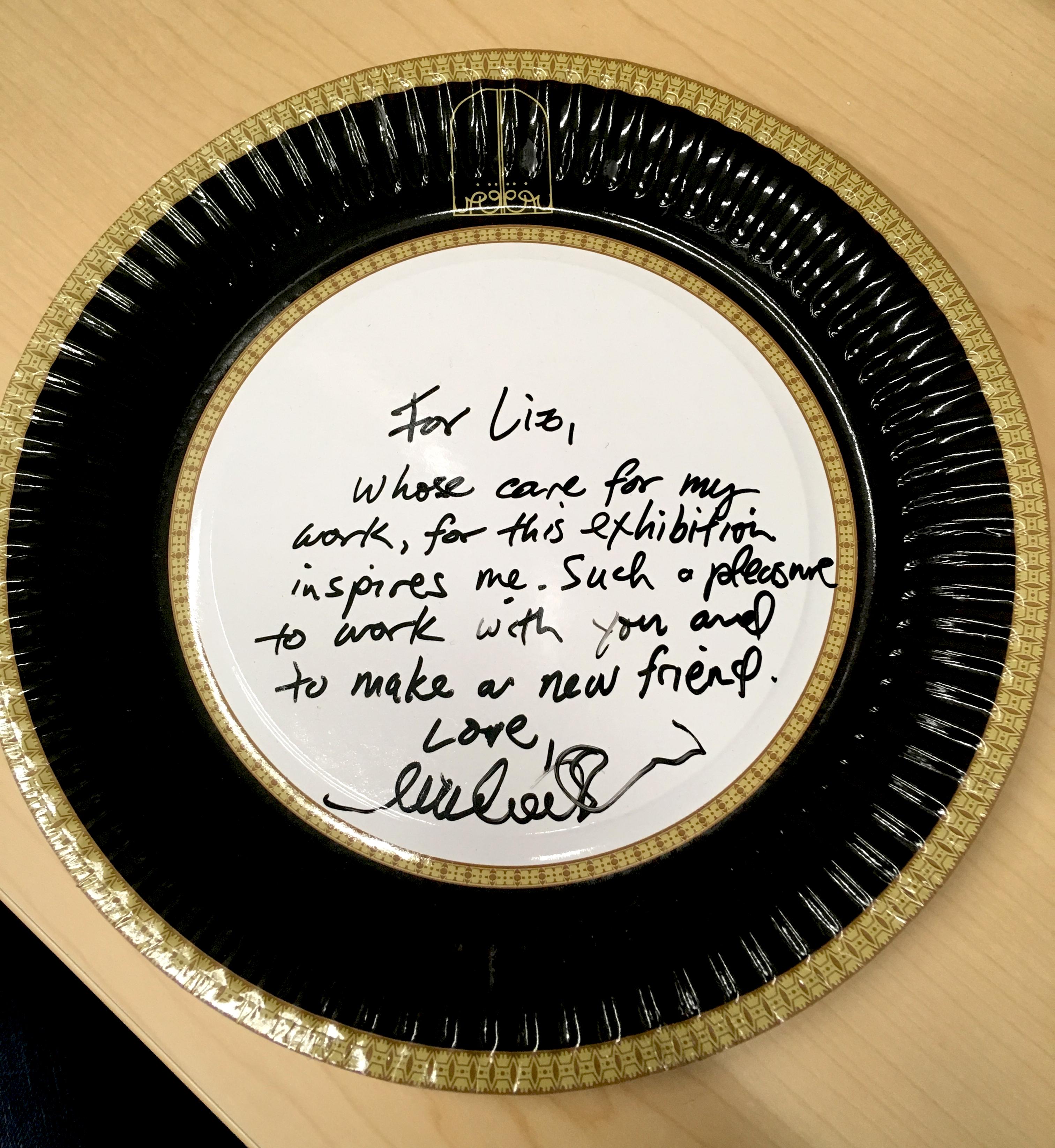 A plate inscribed with 'for liz, whose care for my work, for this exhibition inspires me. Such a pleasure to work with you and to make a new friend