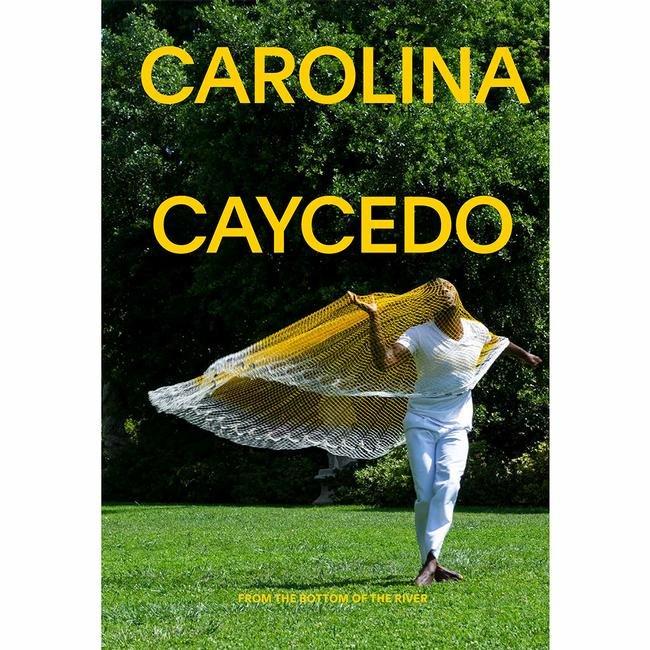 A book cover with the words 'CAROLINA CAYCEDO' imposed over a photograph of a woman in a performance gesture