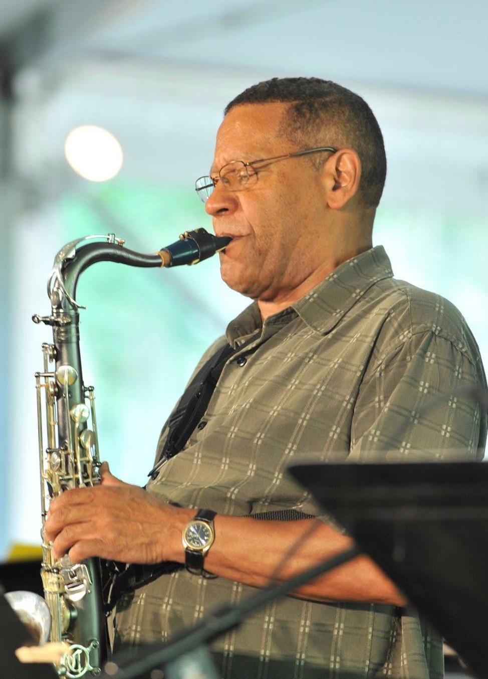 photograph of Edwin Daugherty playing saxophone